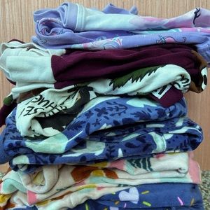 One pile of Girls Pjs. 5 sets in the bundle sizes 8 & 10